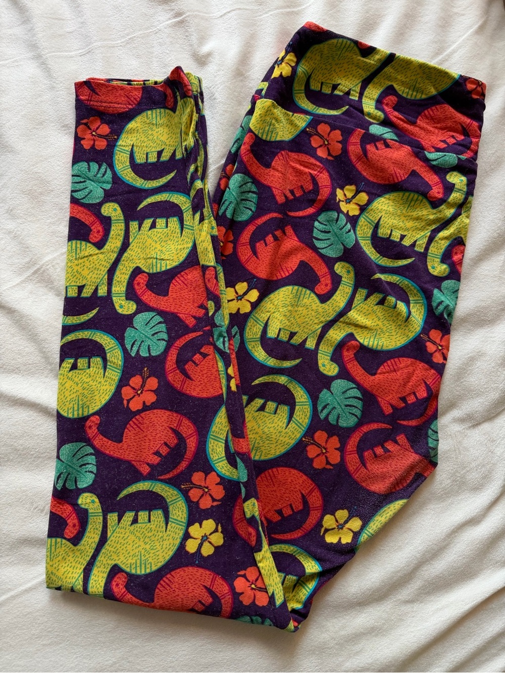 LuLaRoe Purple Leggings with Coral, Yellow & Teal Dino Print